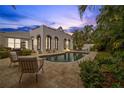 Inviting pool area with lounge chairs and outdoor seating at 220 14Th N Ave, St Petersburg, FL 33701
