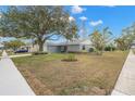 Ranch style home with a well manicured lawn at 4084 Lake Blvd, Clearwater, FL 33762