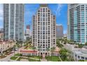 Luxury high-rise building with surrounding landscape and waterfront views at 100 Beach Ne Dr # 1002, St Petersburg, FL 33701