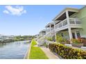 Two story building on the waterfront with canal views at 5012 Starfish Se Dr # C, St Petersburg, FL 33705