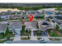 Aerial view showcasing the house's location within a residential community at 12017 Gillingham Harbor Ln, Gibsonton, FL 33534