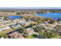 Wide aerial view of the neighborhood, highlighting the property's waterfront location at 1210 Lady Elaine Dr, Valrico, FL 33594