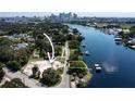 Aerial view of waterfront property with city skyline in background at 2517 N Riverside Dr, Tampa, FL 33602
