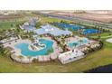 Community pool, water park, tennis and basketball courts at 5289 Everlong Dr, Apollo Beach, FL 33572