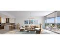 Open concept living area with modern furniture and city views at 235 1St S Ave # 2504, St Petersburg, FL 33701