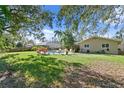 Expansive backyard featuring a kidney-shaped pool at 5265 Venetian Ne Blvd, St Petersburg, FL 33703