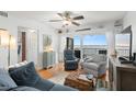 Living room features water views and sliding glass doors at 6287 Bahia Del Mar Cir # 208, St Petersburg, FL 33715
