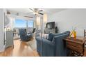 Bright living room with water views and comfy seating at 6287 Bahia Del Mar Cir # 208, St Petersburg, FL 33715