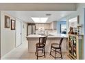 Modern kitchen featuring stainless steel appliances and ample counter space at 1111 Harefield Cir # 62, Sun City Center, FL 33573