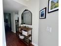 Bright entryway with mirror and storage at 3053 Overlook Pl, Clearwater, FL 33760