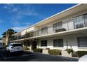 Two-story building exterior with parking and landscaping at 3753 46Th S Ave # 7, St Petersburg, FL 33711
