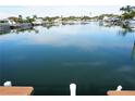 Calm water view with reflections of houses and boats at 3753 46Th S Ave # 7, St Petersburg, FL 33711