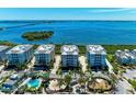 Luxury waterfront community with pool, playground, and lush landscaping at 380 Aruba Cir # 203, Bradenton, FL 34209