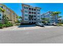 Luxury waterfront community featuring three-story buildings and ample parking at 380 Aruba Cir # 203, Bradenton, FL 34209