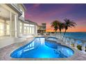 Inviting heated pool and spa overlooking the water at 843 Harbor Is, Clearwater Beach, FL 33767
