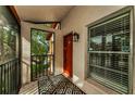 Condo entryway with screened porch and tiled floor at 3455 Countryside Blvd # 34, Clearwater, FL 33761