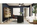 Stylish home office with a dark desk, leather chair, and built-in shelving at 4511 S Manhattan Ave # 19, Tampa, FL 33611