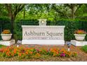 Ashburn Square community entrance with landscaping and signage at 4533 Ashburn Square Dr # 4533, Tampa, FL 33610