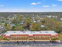 Aerial view showcasing the building's layout and surrounding landscape at 1300 S Hercules Ave # 12, Clearwater, FL 33764