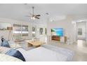 Bright living room with ample natural light and neutral color palette at 1360 Franklin Ln, North Port, FL 34286