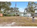 Newly renovated home with curb appeal and a spacious yard at 1415 Ridge Ave, Clearwater, FL 33755