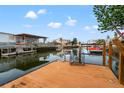 Private dock offering serene waterfront views at 6800 Sanderling Ln, Hudson, FL 34667