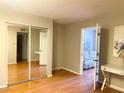 Bright bedroom with mirrored closet and hardwood floors at 100 Waverly Way # 201, Clearwater, FL 33756