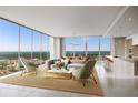 Spacious living room with floor-to-ceiling windows and city views at 235 1St S Ave # 3406, St Petersburg, FL 33701