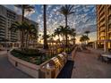 Outdoor grilling area with seating, near the pool at 470 Mandalay Ave # 305, Clearwater Beach, FL 33767