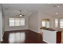 Spacious living room with hardwood floors and high ceilings at 18916 New Passage Blvd, Land O Lakes, FL 34638