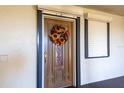 Condo entry door with a fall sunflower wreath at 5020 Bayshore Blvd # 403, Tampa, FL 33611
