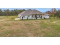 Spacious home on a large lot with plenty of outdoor space at 8459 Harvey Walden Dr, Plant City, FL 33565