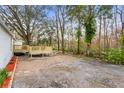 Wooden deck overlooking a wooded area at 26451 Glenhaven Rd, Wesley Chapel, FL 33544