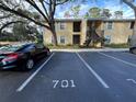 Condo building with parking spaces in front at 3001 58Th S Ave # 701, St Petersburg, FL 33712