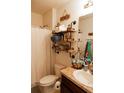 Clean bathroom with a shower, toilet, and floating shelves at 10029 Warm Stone St, Thonotosassa, FL 33592