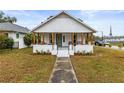 Cute bungalow with a front porch and walkway at 2860 4Th S Ave, St Petersburg, FL 33712