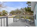 Small deck with two chairs and side table at 5161 Rena N St, St Petersburg, FL 33709