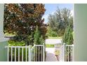 View from porch; shows walkway, street, and neighborhood at 11125 Winthrop Lake Dr, Riverview, FL 33578