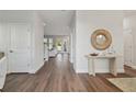 Bright entryway with hardwood floors and stylish decor at 1740 W Saint Louis St, Tampa, FL 33607