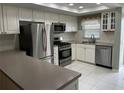 Bright kitchen featuring stainless steel appliances at 1847 Shore S Dr # 316, South Pasadena, FL 33707