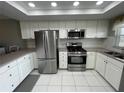 Modern kitchen with stainless steel appliances at 1847 Shore S Dr # 316, South Pasadena, FL 33707