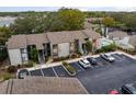 Lake Hiawatha Heights condos, pool, and surrounding neighborhood at 2375 Lake Heather Heights Ct # 202, Dunedin, FL 34698