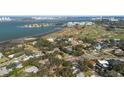 Wide aerial view of the neighborhood, highlighting waterfront and golf course proximity at 530 Ponce De Leon Blvd, Belleair, FL 33756