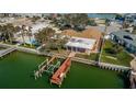 Private dock and backyard oasis overlooking the water at 11650 4Th E St, Treasure Island, FL 33706