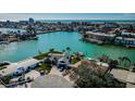 Waterfront property showcasing canal views and boat dock at 11650 4Th E St, Treasure Island, FL 33706