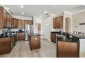 Modern kitchen with stainless steel appliances and granite countertops at 18442 New London Ave, Land O Lakes, FL 34638