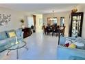 Bright living room with dining area and neutral decor at 2222 Americus N Blvd # 2, Clearwater, FL 33763