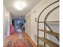 Open hallway with a view into the living room and additional shelving at 2510 Lambdin Dr, Sun City Center, FL 33573