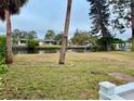 Spacious backyard with canal access and lush landscaping at 4919 Shore Acres Ne Blvd, St Petersburg, FL 33703