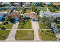 Aerial view of a house and neighborhood, showcasing the property's location and surroundings at 5934 Bayou Grande Ne Blvd, St Petersburg, FL 33703